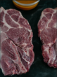 2 Pork Shoulder Steaks W/ Carolinia Gold BBQ